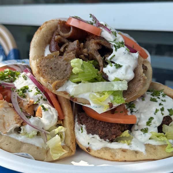 Still a few days left to enter our Gyro photo contest! Share a pic of your favorite Athenian Grill Gyro on Facebook or Instagram this weekend and tag us for a chance to win a gift card. Happy eating! 😋🤳🥙