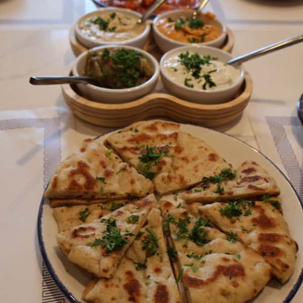 Why limit yourself to just one of our incredible Greek dips when you can try four? Our Mezze Platter lets you choose between our Htipiti (spicy feta), traditional Hummus, Roasted Red Pepper Hummus, Tzatziki or Melitzanosalata (roasted eggplant) dips. 

All served with our best-selling Pita Bread, which we import from Athens for true Greek authenticity. Grab a friend, a family member or a co-worker and mix and match to your heart's content. We hope to see you at Athenian Grill soon! 🥙🇬🇷