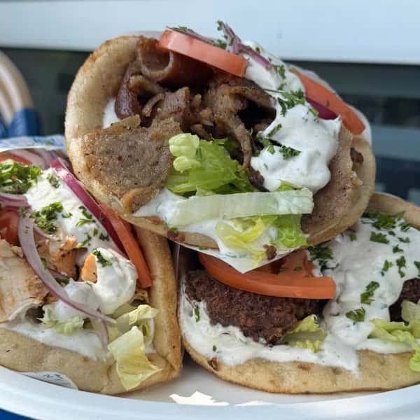Let’s show a little love for the star of the show, the MVP of our menu, the legend that started it all, the true hero- our GYRO! 😍🥙

The secret to our Gyros is that every ingredient is intentional. Our Pita is imported from Greece, the meat is tender from slow-roasting on a rotisserie, our dips and sauces are made from traditional recipes and the veggies are peak freshness. 

Let’s celebrate our hero Gyros together- tell us: what’s YOUR favorite Gyro? 🥙 🇬🇷🥰

#gyro #greekgyro #mediterraneanfood