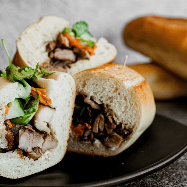 Sliced rolls of meat and veggie filled Vietnamese food