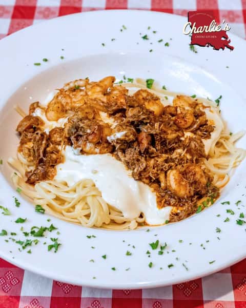 Warning: This pasta is guilty of stealing the spotlight.
Seafood fondue, blackened shrimp, crawfish, crabmeat, and creamy Parmesan sauce come together in one unforgettable plate.
Investigate the flavor at Charlie's Creole Kitchen!
#charliescreolekitchen #eastdallas #dallasfood #dallastx #dallasfoodies #charliescreoledtx #LowerGreenville #dallas #dallasmardigras #dallascatholic #stthomasaquinasdallas #lowergreenvilledallas #eastsidedallas #lakewooddallas #mstreetsdallas