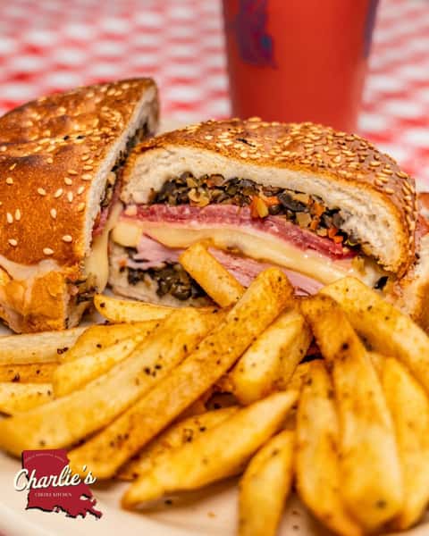 A New Orleans classic, stacked high! Genoa salami, ham, mortadella, melty cheese, house-made olive salad, and crispy Cajun fries.
Grab your Muffuletta at Charlie's!
#charliescreolekitchen #eastdallas #dallasfood #dallastx #dallasfoodies #charliescreoledtx #LowerGreenville #dallas #dallasmardigras #dallascatholic #stthomasaquinasdallas #lowergreenvilledallas #eastsidedallas #lakewooddallas #mstreetsdallas