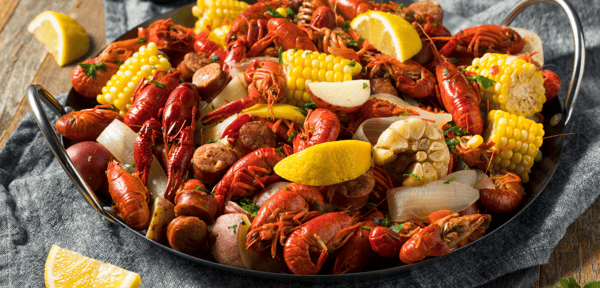 crawfish boil with corn, sausage and potatoes