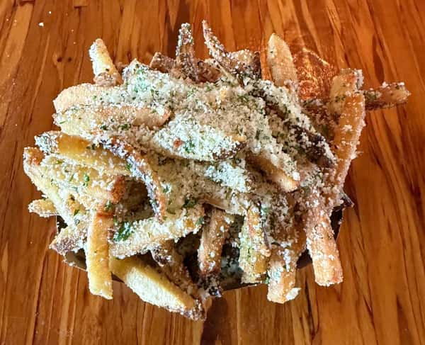 Parmesan-covered french fries are served at Main Street Eats.