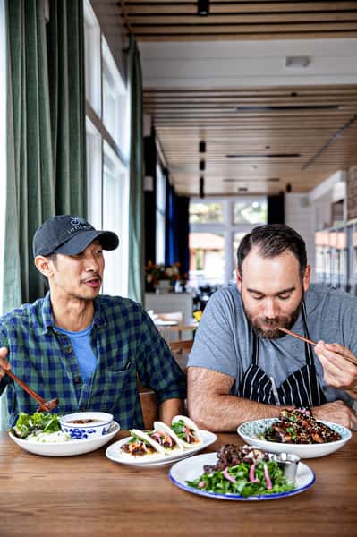 Diners eating Vietnamese food