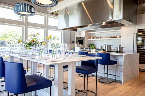 Kitchen area with a decorated countertop and barstools