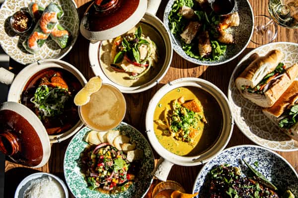 A table full of Vietnamese dishes