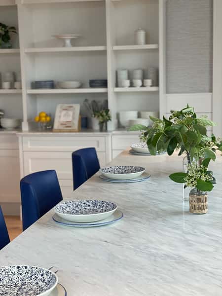 Marble table top setup with plates and vases