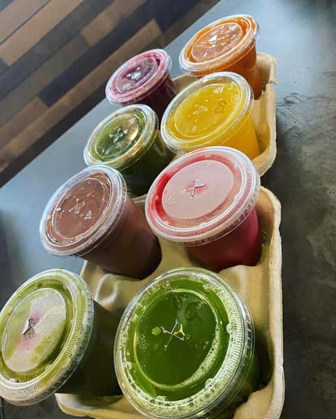 two trays of juices