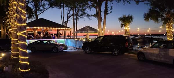 NIGHT TIME AT COCO LOCOS TIKI BAR AT LAKE EUSTIS WATERFRONT GRILLE
