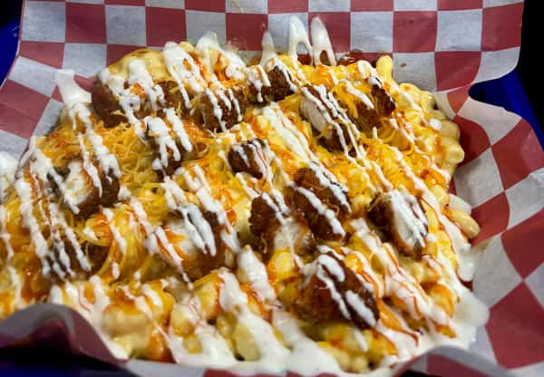 Crispy chicken, cheese and hot or mild sauce atop a base of hand cut fries or mac-n-cheese