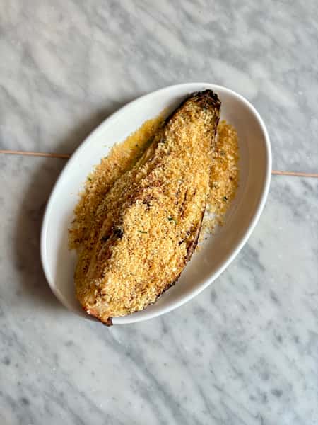 Hispi cabbage with anchovy butter