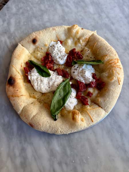 Sun-dreid tomatoes, stracciatella, basil