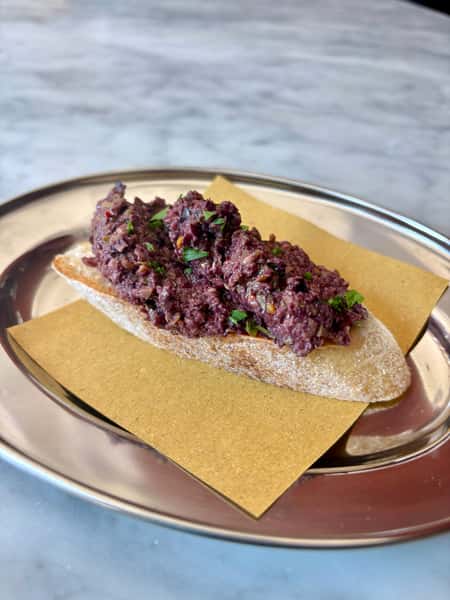 Olive tapenade crostino