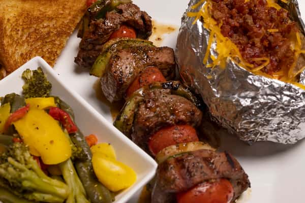 kabob with baked potato