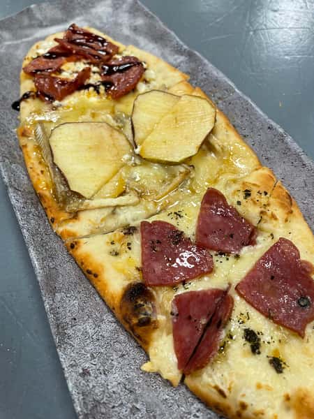 Mushroom & Mozzarella with truffle oil drizzle and scallions