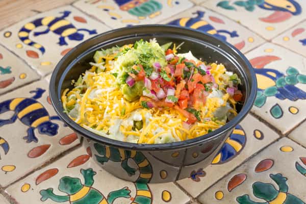 Chicken Taco dish in a black plastic bowl
