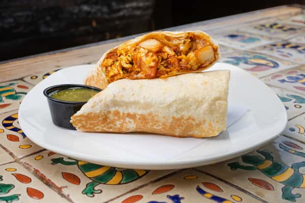 Chorizo Breakfast Burrito sliced in half to display insides