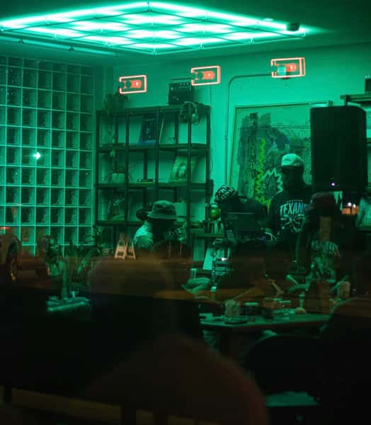 People enjoying Bingo game with cocktails and wine