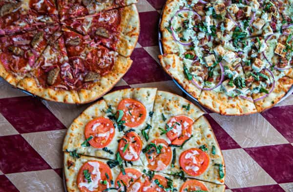 Family Feast: Two Pizzas + Caesar Salad + Piccante Wings (Take-Out Only)