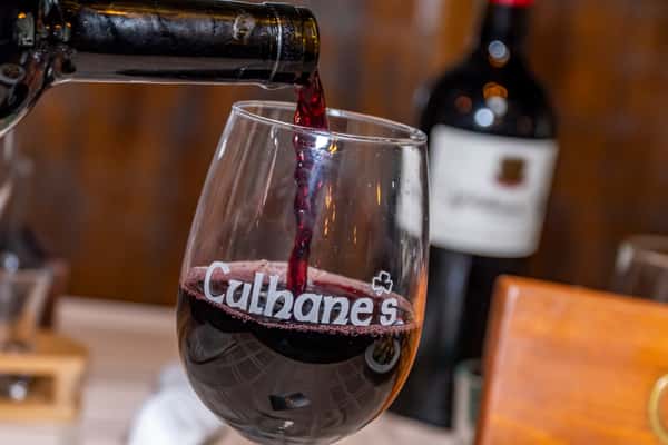 Pouring wine into a glass