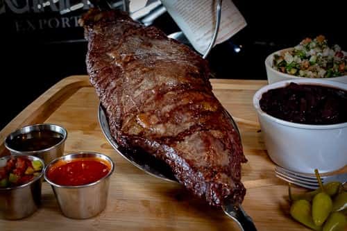 FC. THE Bottom Sirloin 1 Pound, served with 1 one pound of rice, 1 poubd of potato salad.
