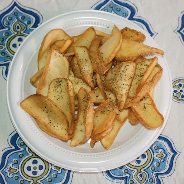 Potato chips on a white plate