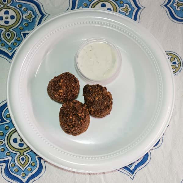 Greek meatballs on a white plate