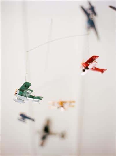 model airplanes hanging from a ceiling