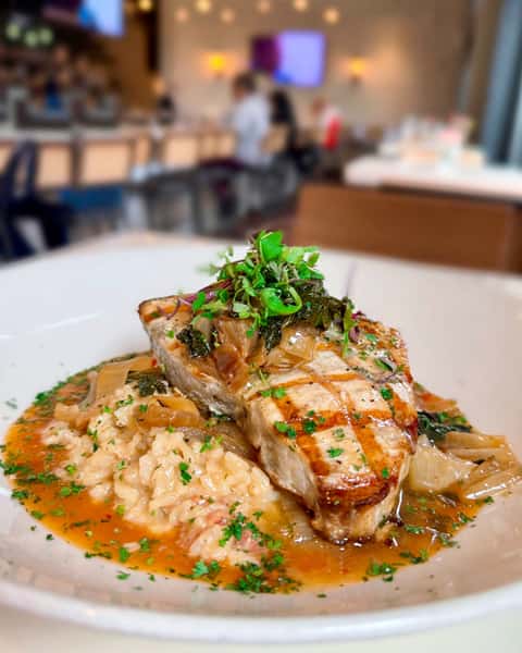 Beat the rain and join us for a comforting plate like this Swordfish special with smoked tomato risotto, braised kale & onions and spicy lobster sauce! 🌧☔️