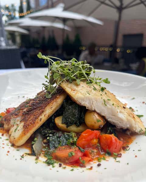 New special! Blackened Red Snapper with fingerling potatoes, braised tuscan kale, cherry tomatoes, spicy puttanesca & crispy prosciutto... perfect for a summer supper on the patio π