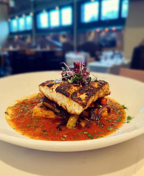 We've got some new specials on deck this week, including this blackened striped bass over smoked tomato polenta cake with charred vegetables & spicy puttanesca! 

Why wait until Friday to eat fish?? Join us tonight!