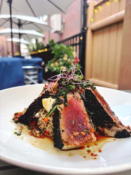 Seared Tuna crusted with black sesame seeds over vegetable quinoa salad and sauteed bok choy..... dish of the summer? 😎