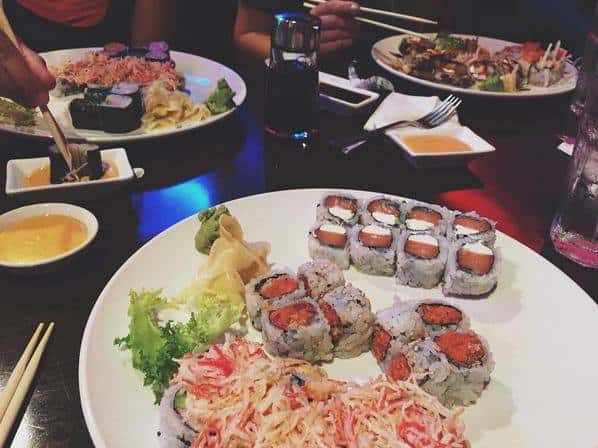 platters of sushi rolls