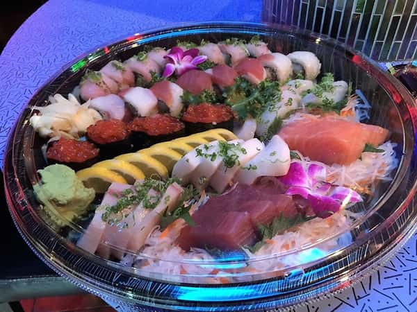 large platter of sushi rolls