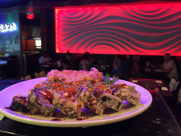 sushi platter being handed out