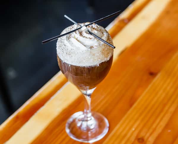 Backswoods also has a vast cocktail menu with specialty drinks and wine like this smoke and fire coffee