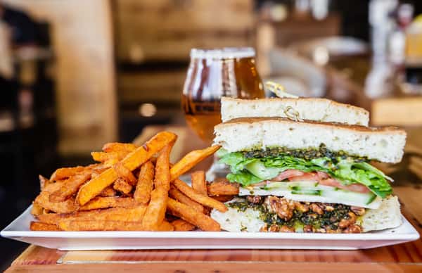 Backwoods veggie pesto sandwich and homemade fries
