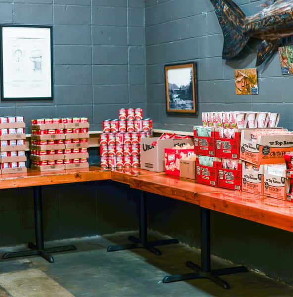 Backwoods Foundation food collection on tables at Carson Pub