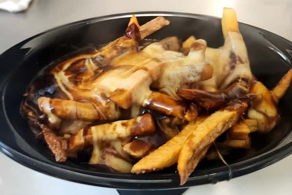 Fries with sauce and cheese