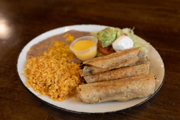 Chicken Flautas with rice and beans