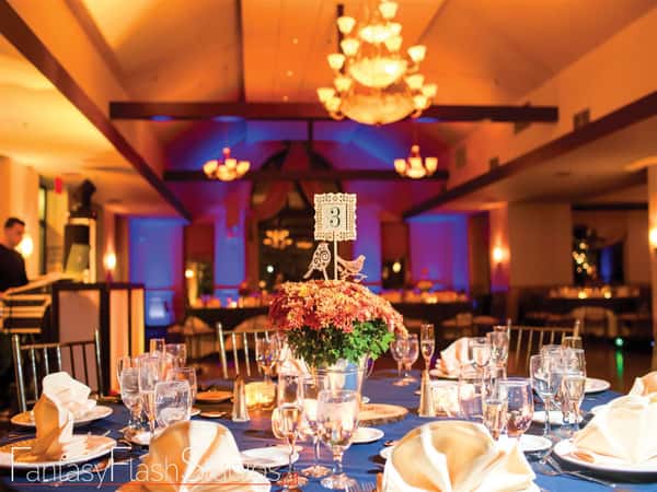 banquet table set inside of a dining room