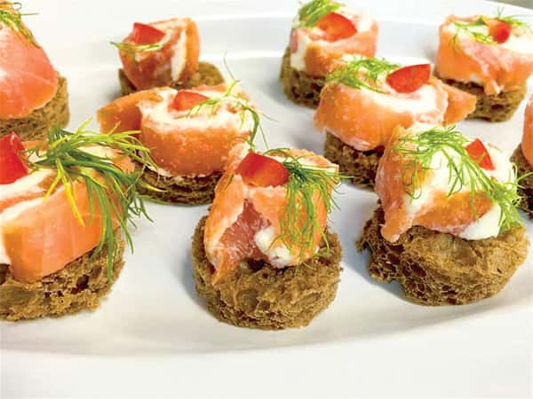 crustini topped with salmon rolls
