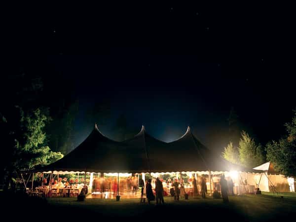 party tent lit up at night