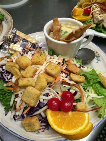 Side Salad topped with Croutons and a cup of Soup