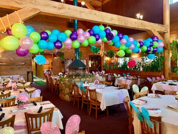 party room filled with decor and balloons