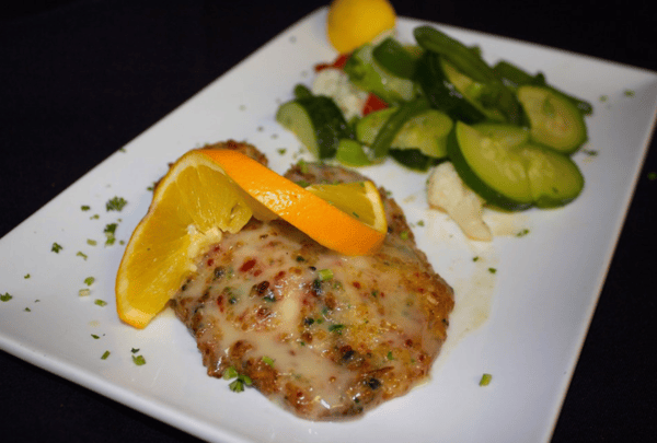 chicken francaise with a side salad