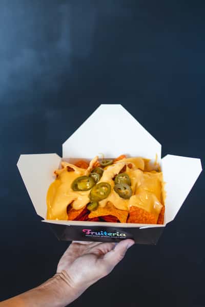 Queso Box! Your favorite chips made into nachos... Boom, that just happened!