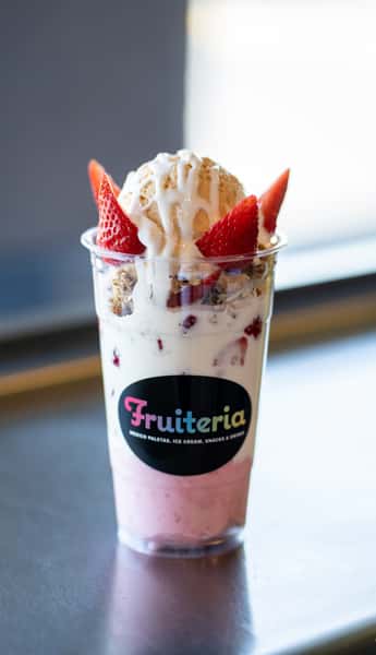 Another variation of our Fresa Cup, this one has our freshly made strawberry ice cream and our pecan ice cream