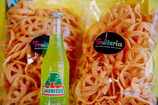 Puffed-up crispy little wheels of joy! These street style snacks are fried 'til they are light as air, then dressed your way with fresh lime juice or lime and hot sauce. You decide! It's a crunchy, zest, goodness. It's the snack your inner child and snack loving soul have been waiting for.